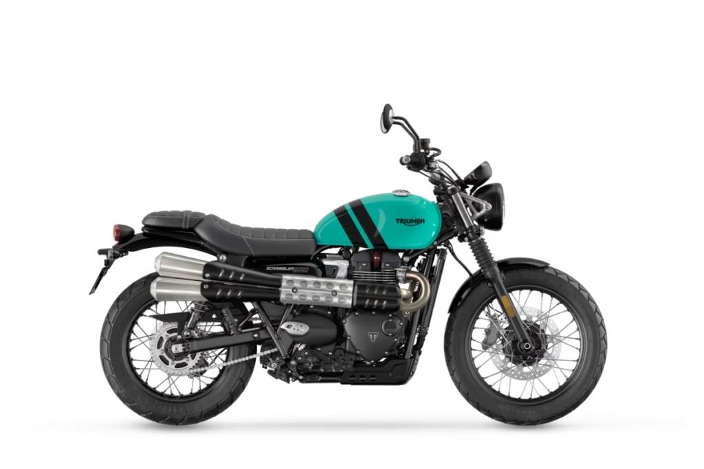 Close-up of Triumph Scrambler 900 retro headlight and teardrop fuel tank design